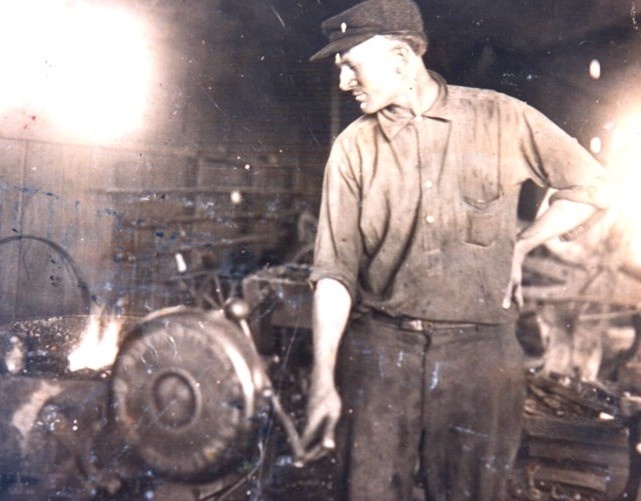 Albert Cook in the blacksmith shop